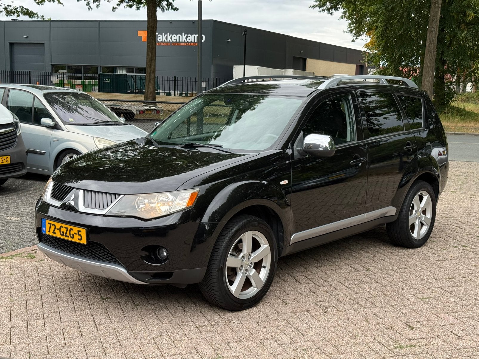 Mitsubishi Outlander 2.4 AUTOMAAT 4WD Zwart invalide auto, Auto's, Automaat, Outlander, 4 cilinders, 7 stoelen
