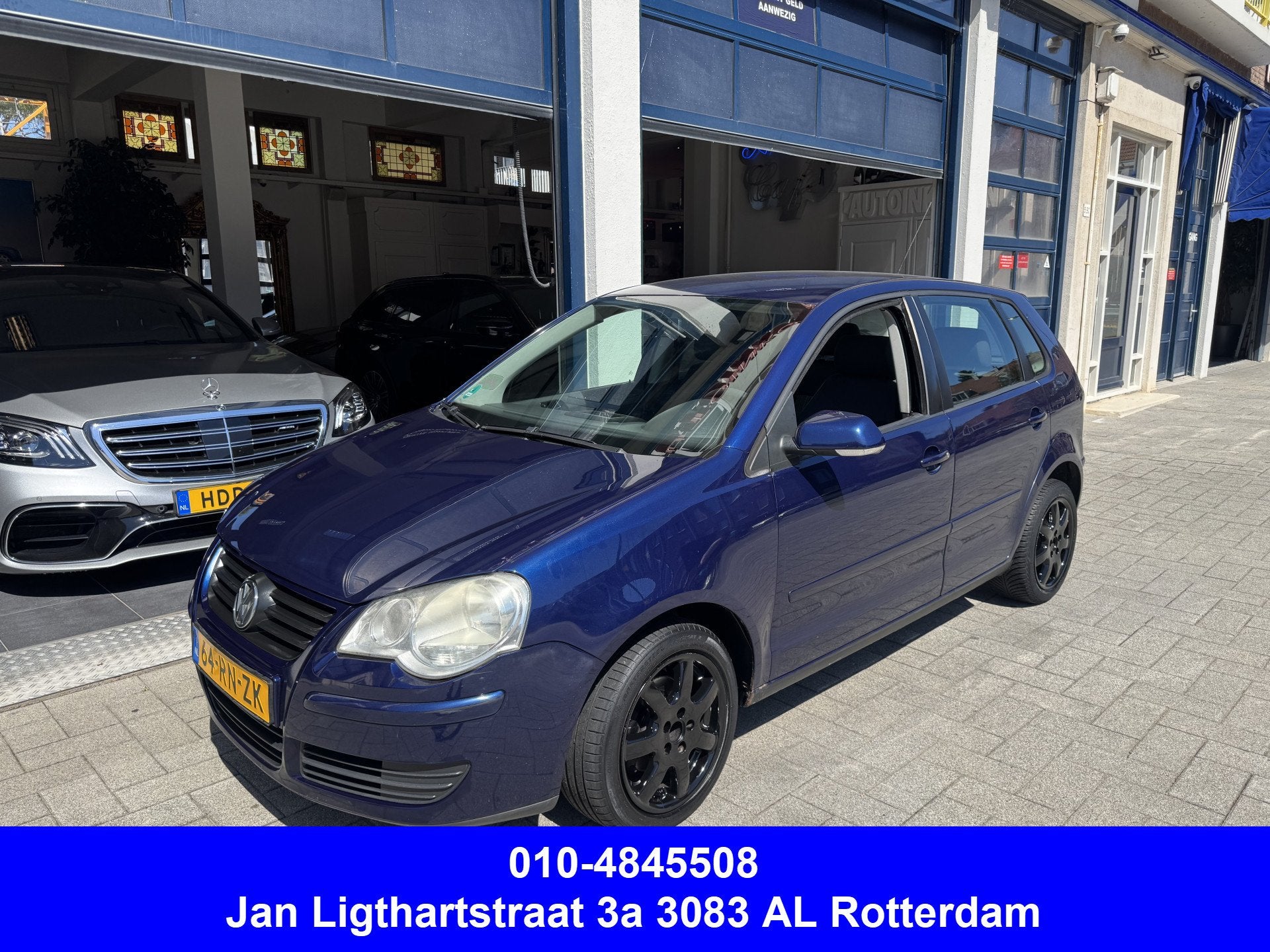 Volkswagen Polo 1.4-16V Turijn AUTOMAAT/AIRCO (bj 2005), Auto's, Elektrische ramen, 4 cilinders, Blauw, Origineel Nederlands