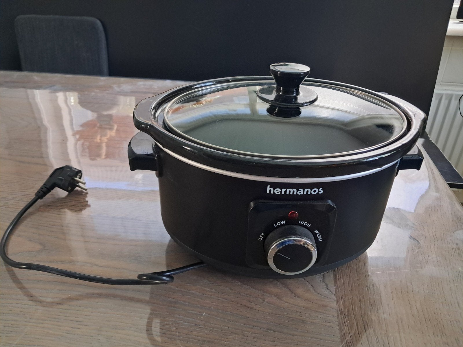 Hermanos slowcooker, Ophalen
