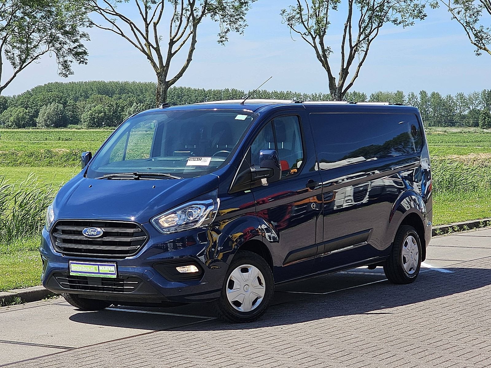 FORD TRANSIT CUSTOM l2h1 navi trekhaak!, Auto's, Gebruikt, Euro 6, Navigatiesysteem, Blauw