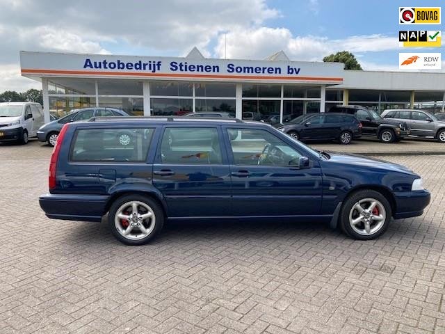 Volvo V70 2.5 T Exclusive, Auto's, Gebruikt, Blauw, 7 stoelen, Grijs
