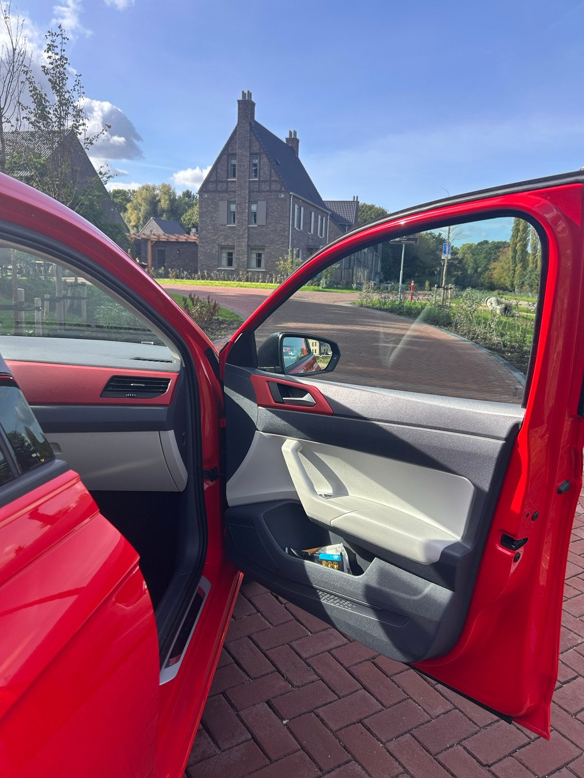 Volkswagen Polo 1.0 TSI 70KW 5D 2018 Rood, Voorwielaandrijving, 40 €/maand, Leder en Stof, Origineel Nederlands