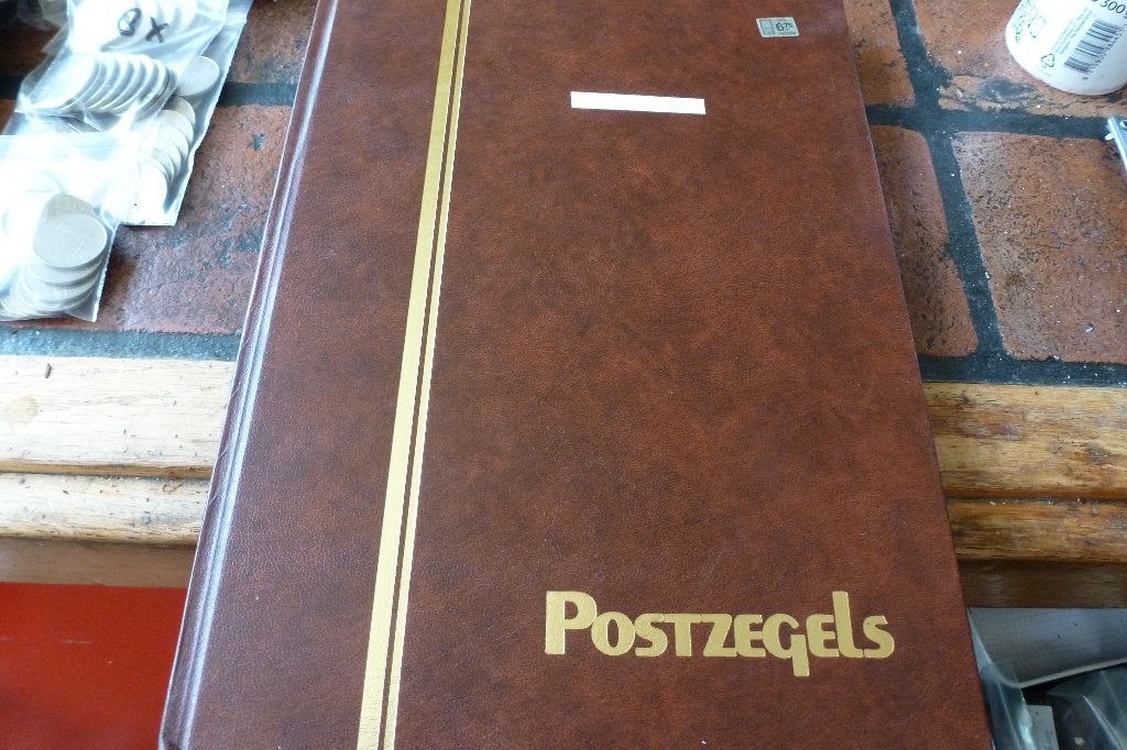 Mooi boek wereld postzegels diverse landen (ca 7, Ophalen of Verzenden, Nederland en Buitenland