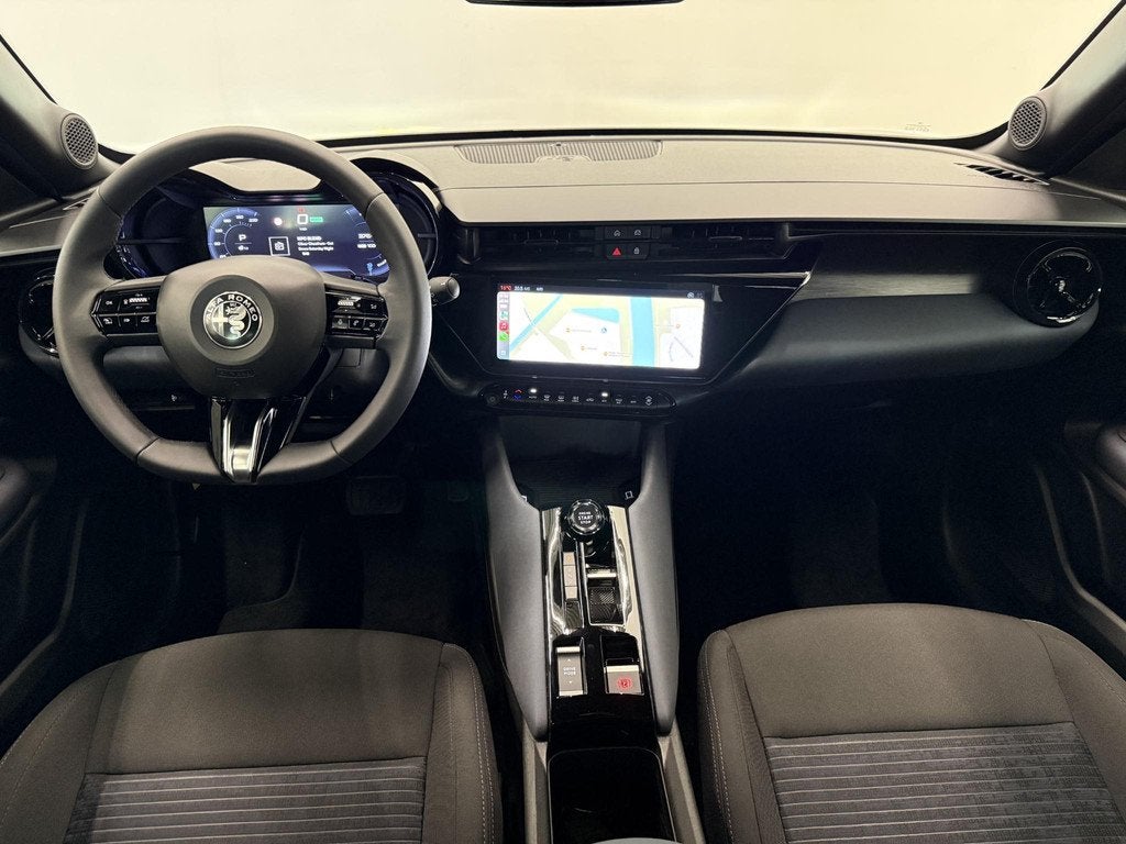 Alfa Romeo Junior Elettrica Automaat 156PK Adaptieve Cruise, 413 km, Stof, Gebruikt, Blauw