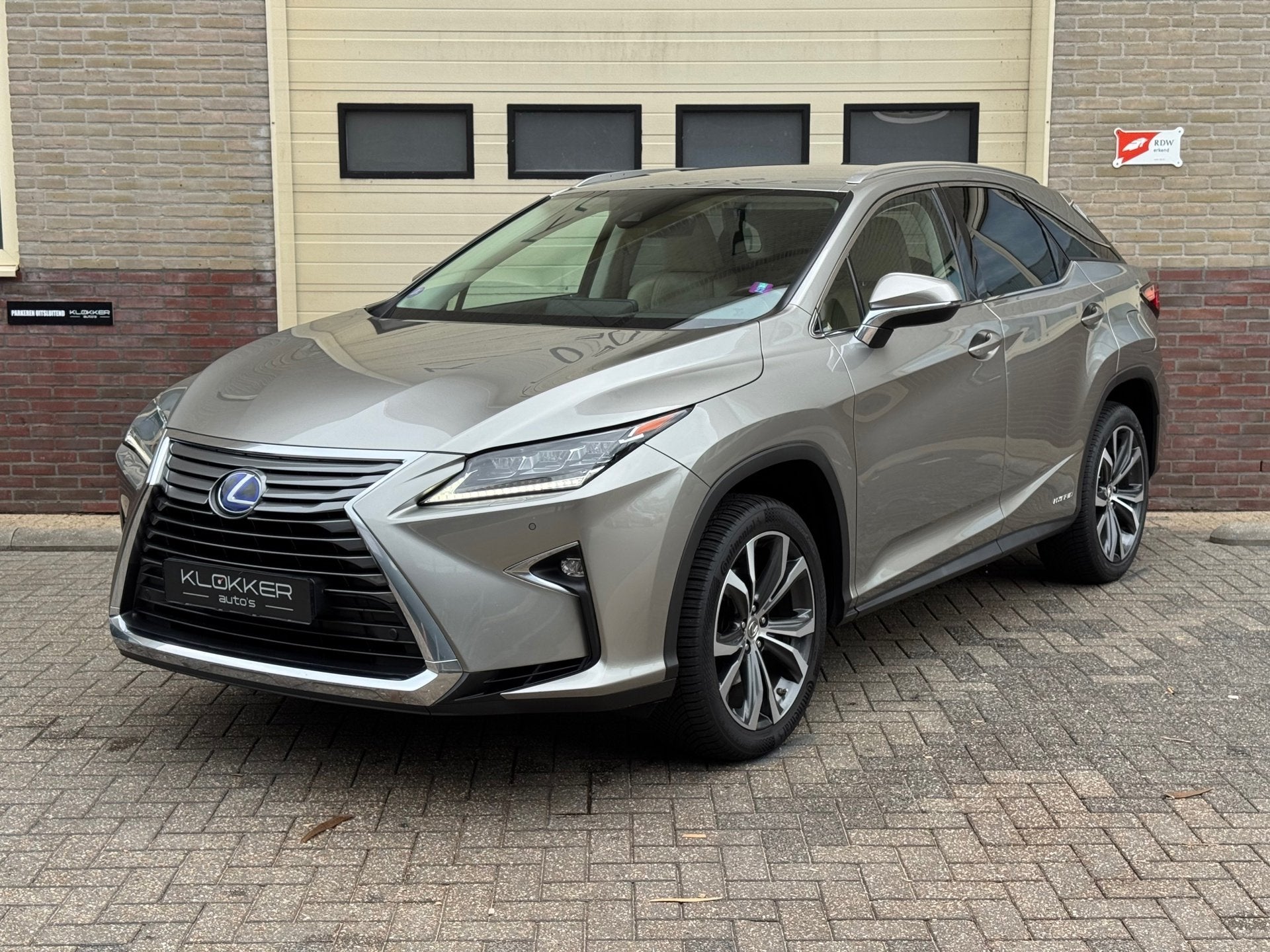 Lexus RX 450h 4WD Luxury Line Headup|Dealer ondh.|2E EIG|ORI, Auto's, Automaat, Dealer onderhouden, 2000 kg, 138 €/maand