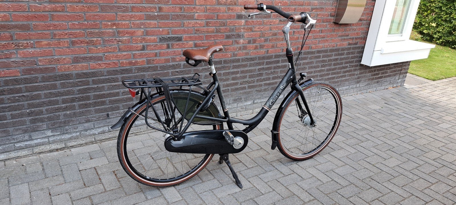Gebruikte zwarte Gazelle Bloom damesfiets met 7 versnellinge, Ophalen, Gebruikt, Versnellingen, 56 cm of meer