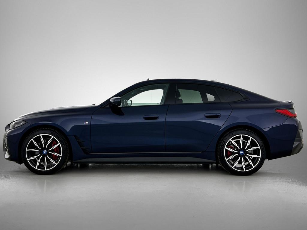 BMW i4 eDrive40 High Executive 84 kWh | M Sportpakket Pro |, Auto's, BMW, Gebruikt, Zwart, Adaptive Cruise Control, Blauw