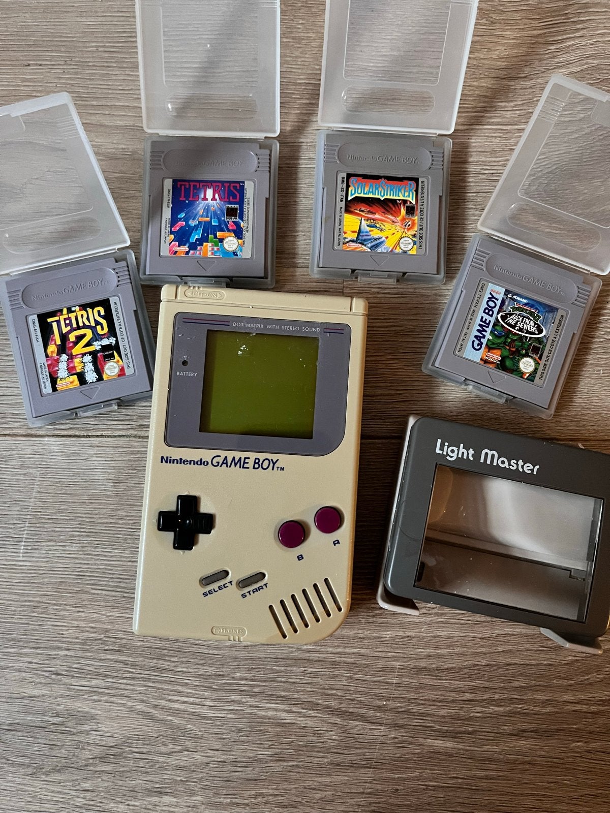Game Boy (defect) met Light Master en 4 spellen + handleidin, Ophalen, Niet werkend