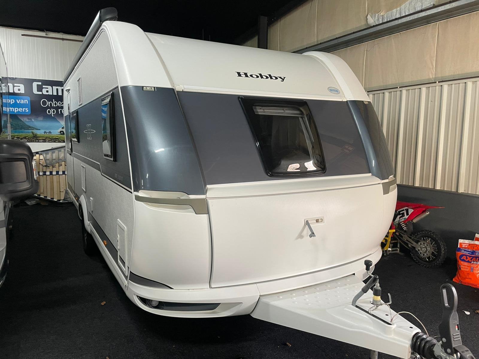 Hobby 560 kmfe 3 stapelbedden, Caravans en Kamperen, Rondzit, Hobby, Particulier, Tot en met 6