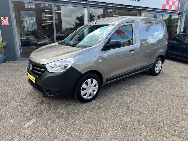 Dacia Dokker 1.6 MPI 100 Basic (bj 2016), Auto's, Stof, Gebruikt, Euro 6, Handgeschakeld