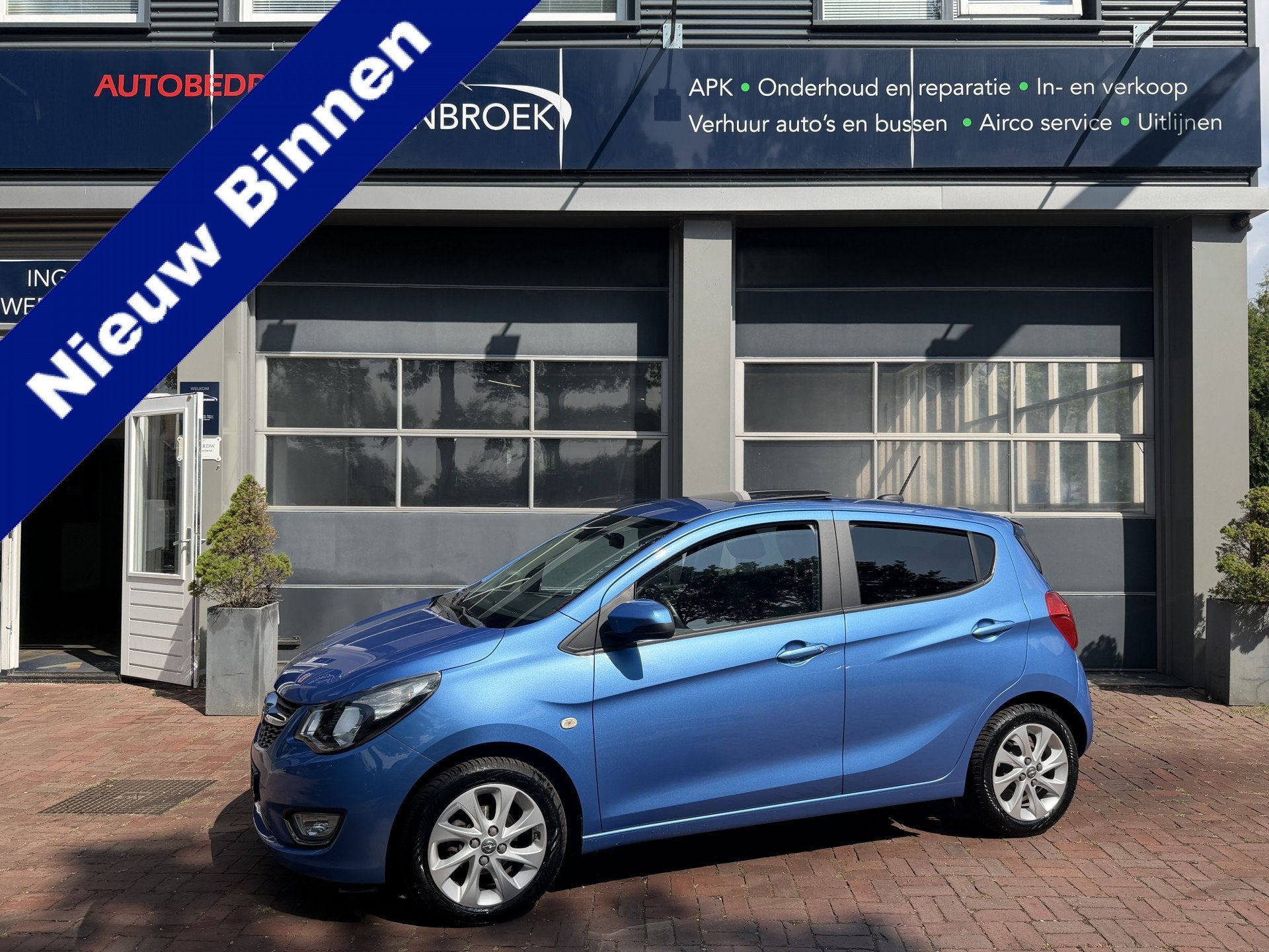Opel KARL 1.0 ecoFLEX Cosmo Airco,14Inch,Cv,Cruise,Schuifdak, Voorwielaandrijving, Gebruikt, Blauw, Leder en Stof