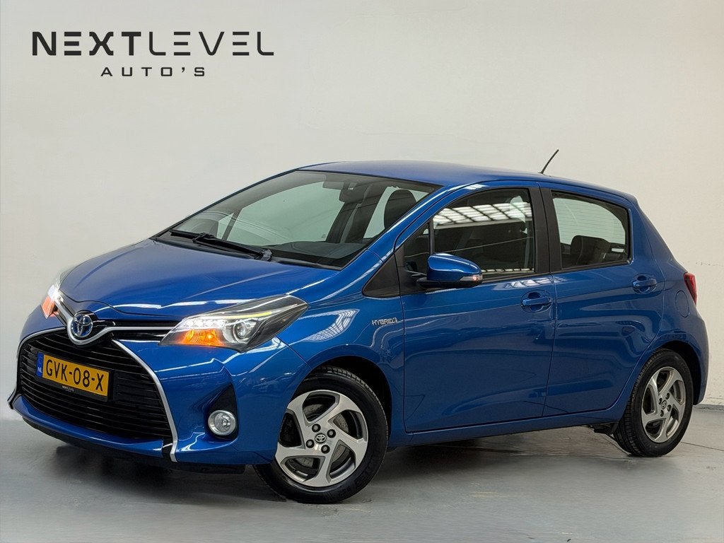 Toyota Yaris 1.5 Hybrid Aspiration Achteruitrijcamera Cruise, Auto's, Gebruikt, 4 cilinders, Blauw, Bedrijf