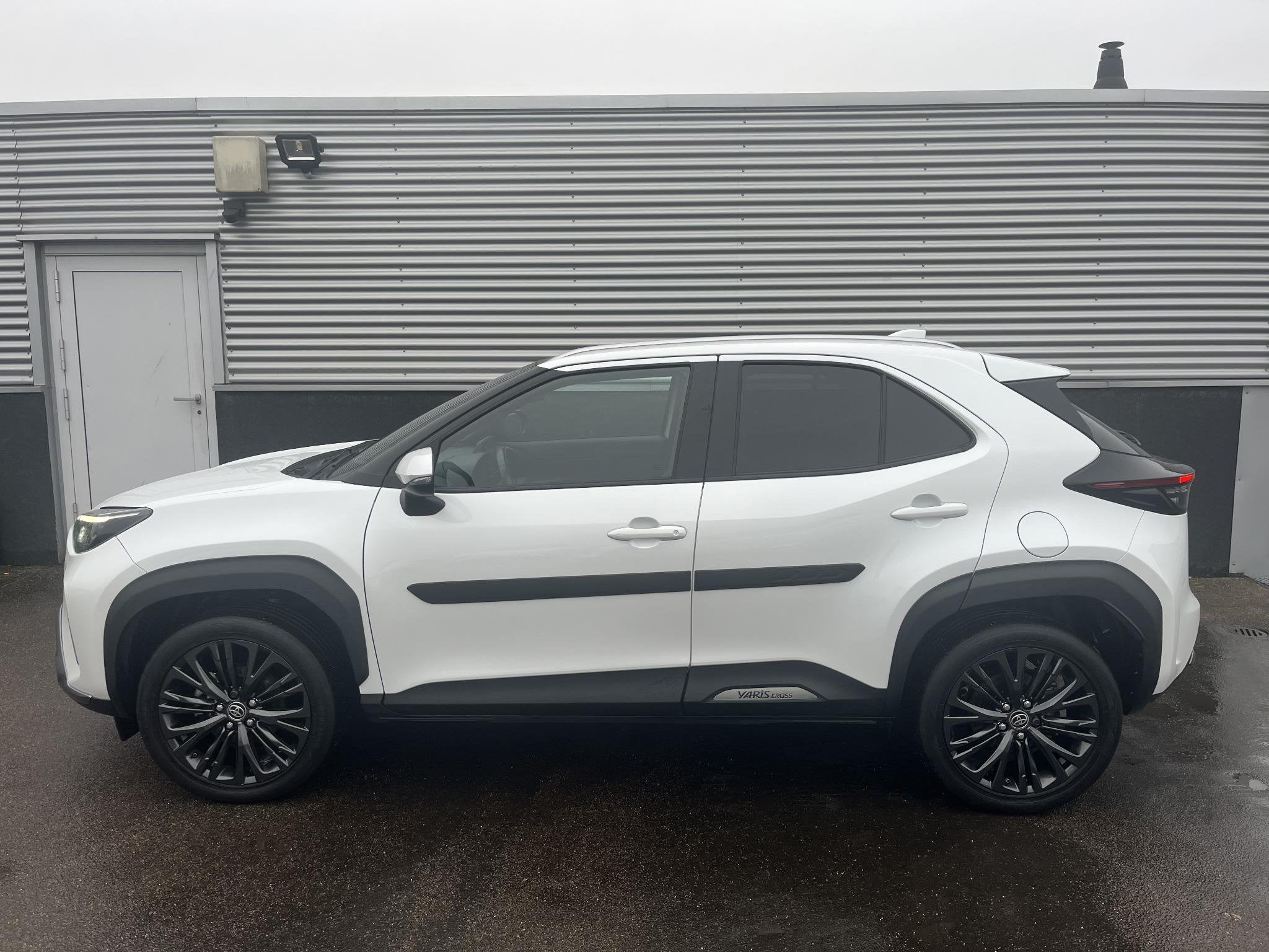 Toyota Yaris Cross 1.5 Hybrid Adventure AWD Panoramadak, Sto, Auto's, Gebruikt, Wit, 1490 cc, Bedrijf