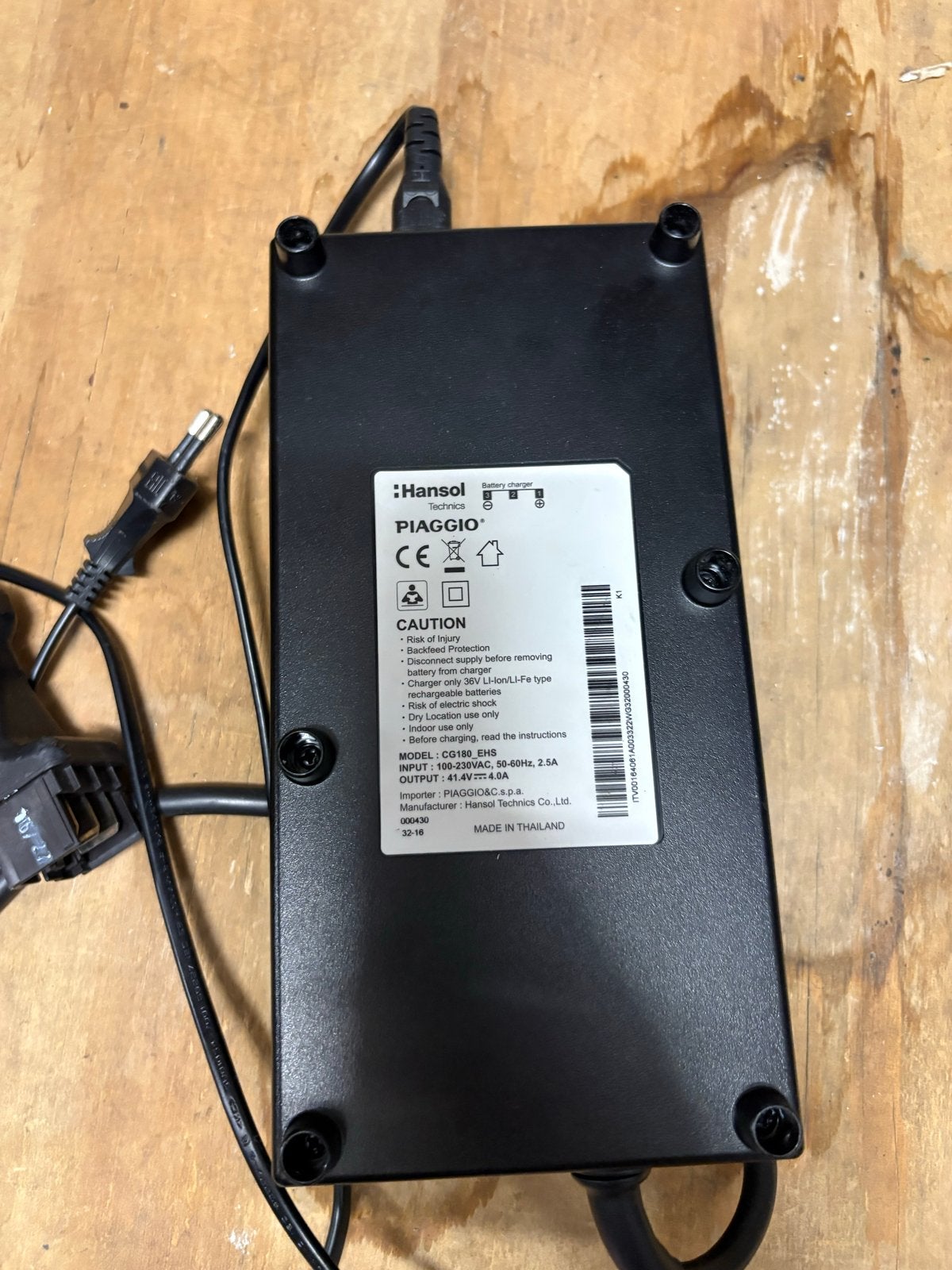 Piaggio Wi-bike acculader - Origineel Hansol, Ophalen, Gebruikt