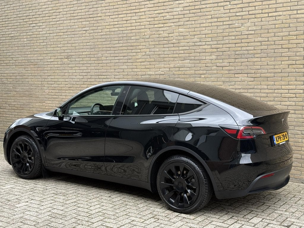 Tesla Model Y Long Range AWD 75 kWh | 20 inch velgen | Leder, Auto's, Tesla, Automaat, Stof, Gebruikt, 514 pk