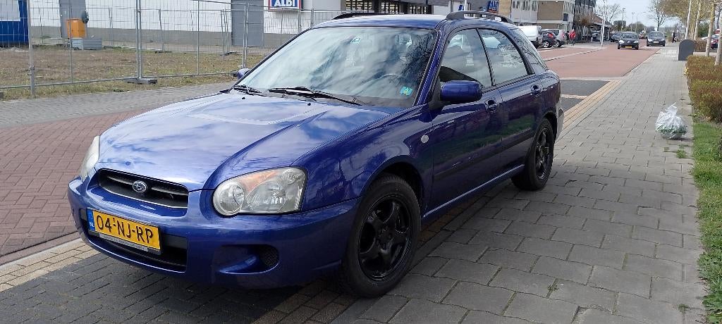 Subaru Impreza 1.6 TS Plus AWD 2003 Blauw 4x4 trekhaak cruis, Auto's, Stof, Zwart, Blauw, Origineel Nederlands
