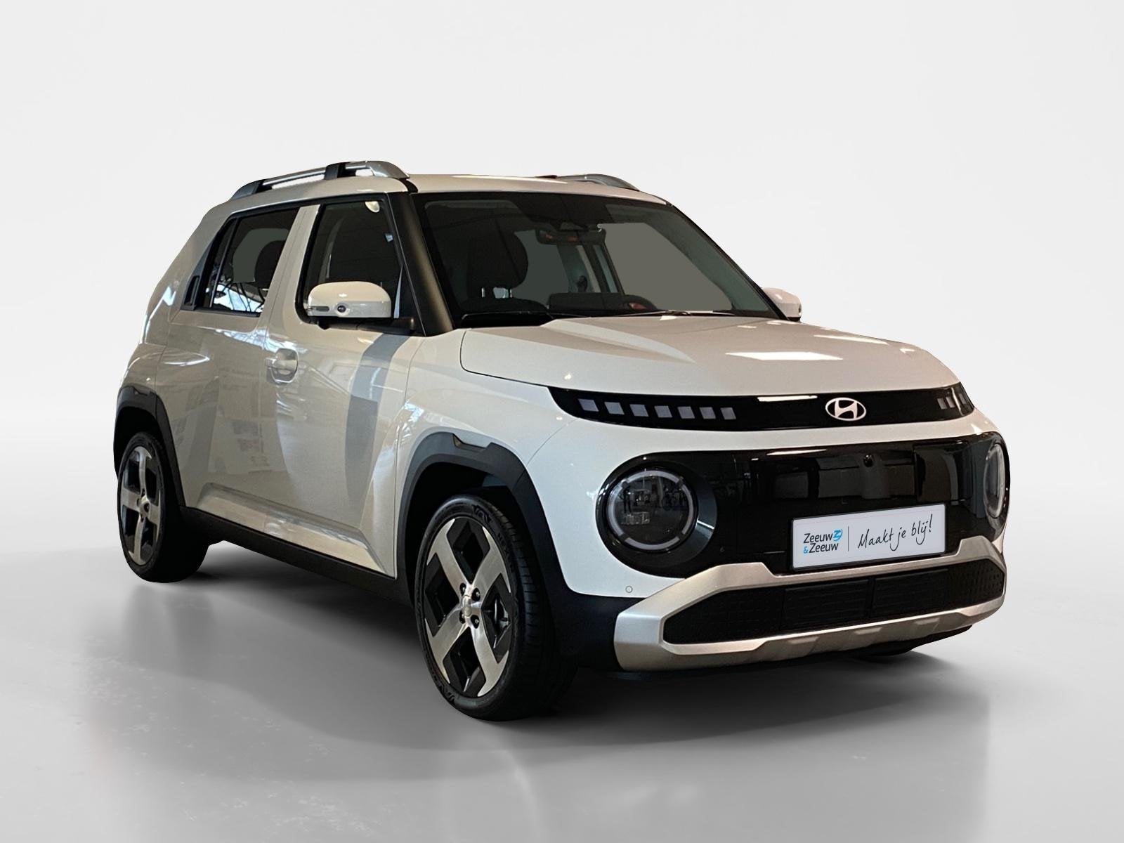 Hyundai INSTER EVOLVE W&T 49 KWH | WINTER PACK & TECH PACK |, Auto's, Stof, Automatische klimaatregeling, 116 pk, Wit