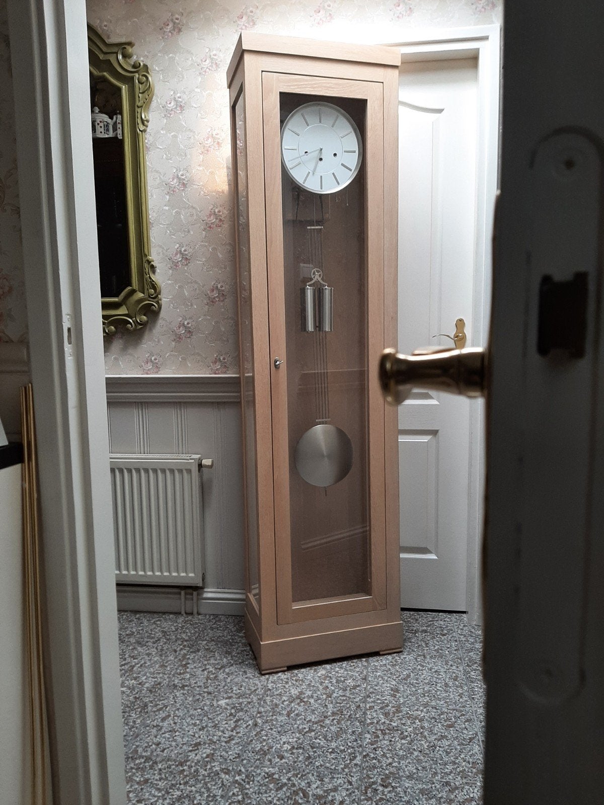 Moderne staande klok met Westminster slag, Ophalen