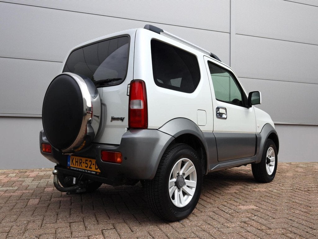 Suzuki Jimny 1.3 Exclusive 4WD (Vol-Opties!) Two-Tone, Auto's, Euro 5, 86 pk, Gebruikt, Zwart
