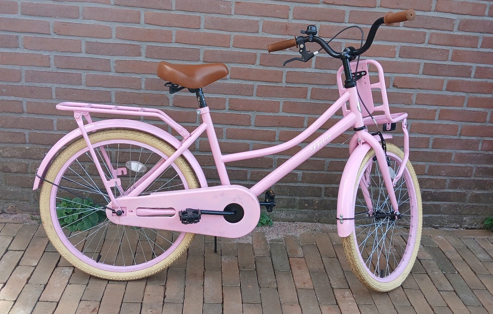 22 inch Roze kinderfiets met voordrager - Zo goed als nieuw, Fietsen en Brommers, Ophalen, 20 inch, Onbekend, Velgrem