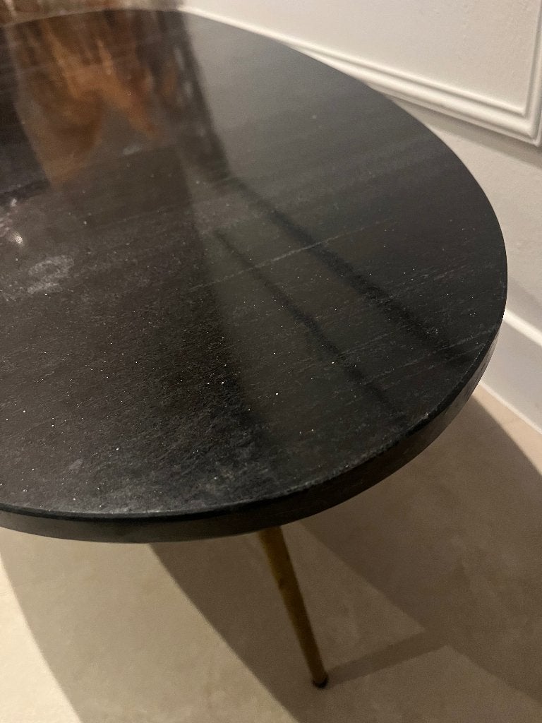 Zwarte ovale salontafel van Goossens wonen met metalen poten, Ophalen, Gebruikt, 50 tot 100 cm, 100 tot 150 cm