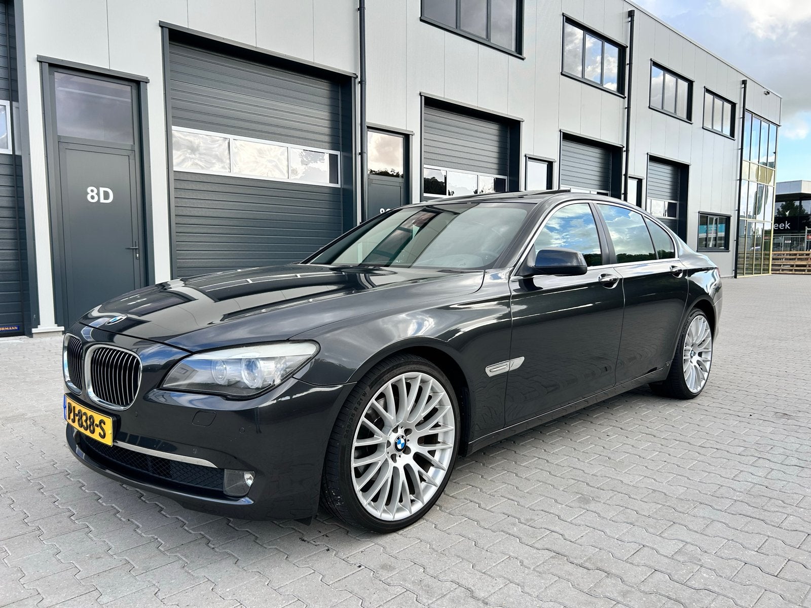 BMW 7-Serie 3.0 I 740 AUT 2011 Grijs, Auto's, Automaat, Lichtsensor, Achterwielaandrijving, Zwart