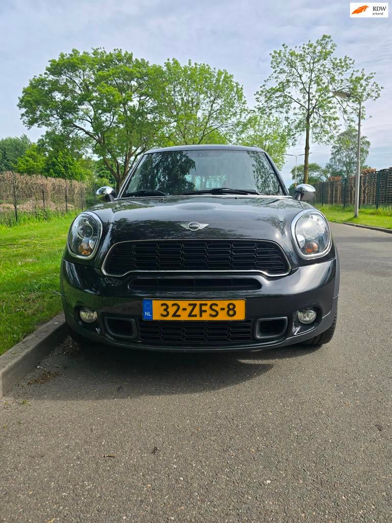 Mini Mini Countryman 2.0 Cooper SD ALL4 Chili 4x4 leest text, Auto's, Mini, Euro 5, 1370 kg, Leder en Stof, Zwart