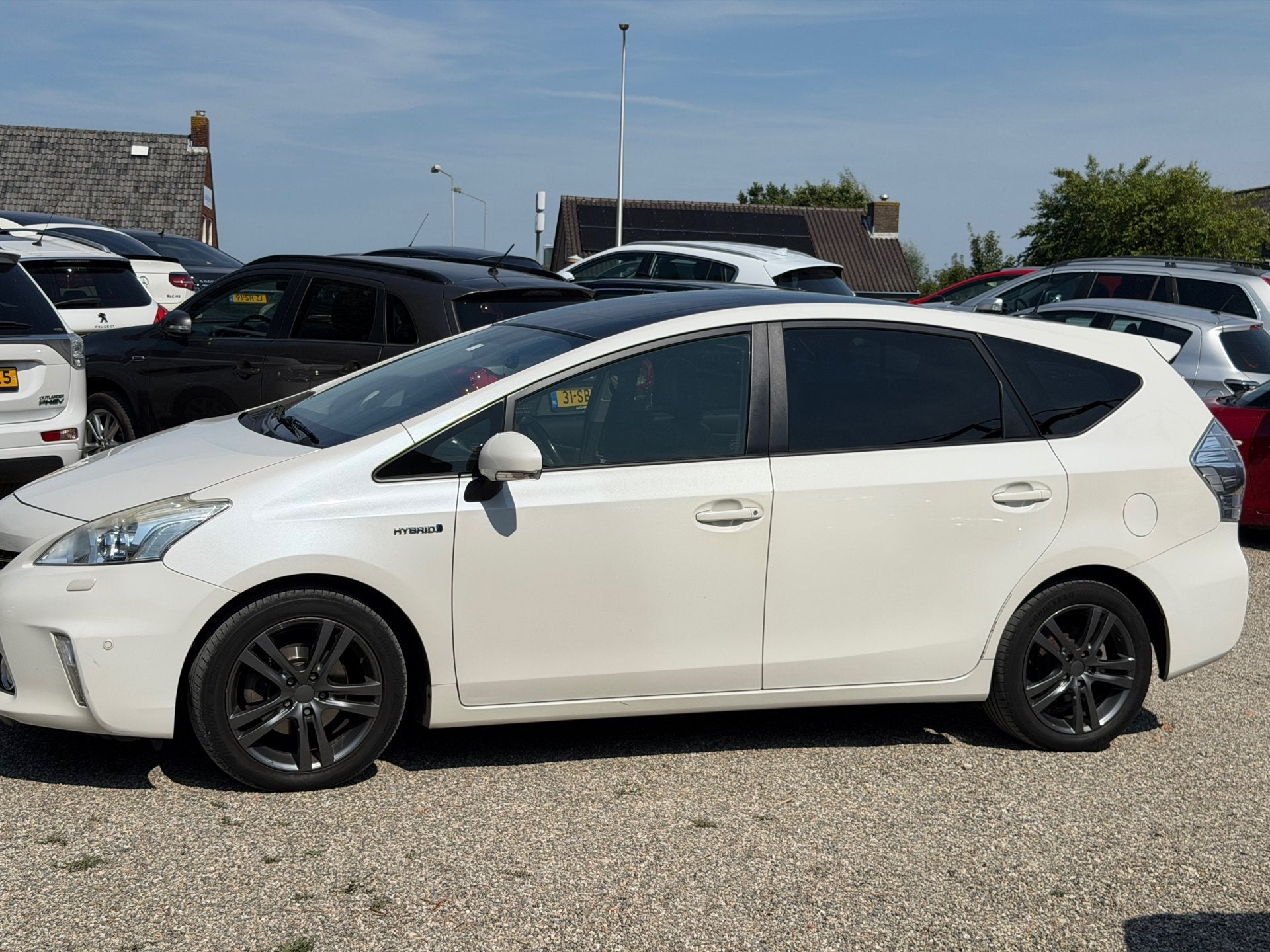 Toyota Prius Wagon 1.8 Dynamic Business 96g Leer Pano Adapti, Auto's, Gebruikt, Zwart, 4 cilinders, 7 stoelen