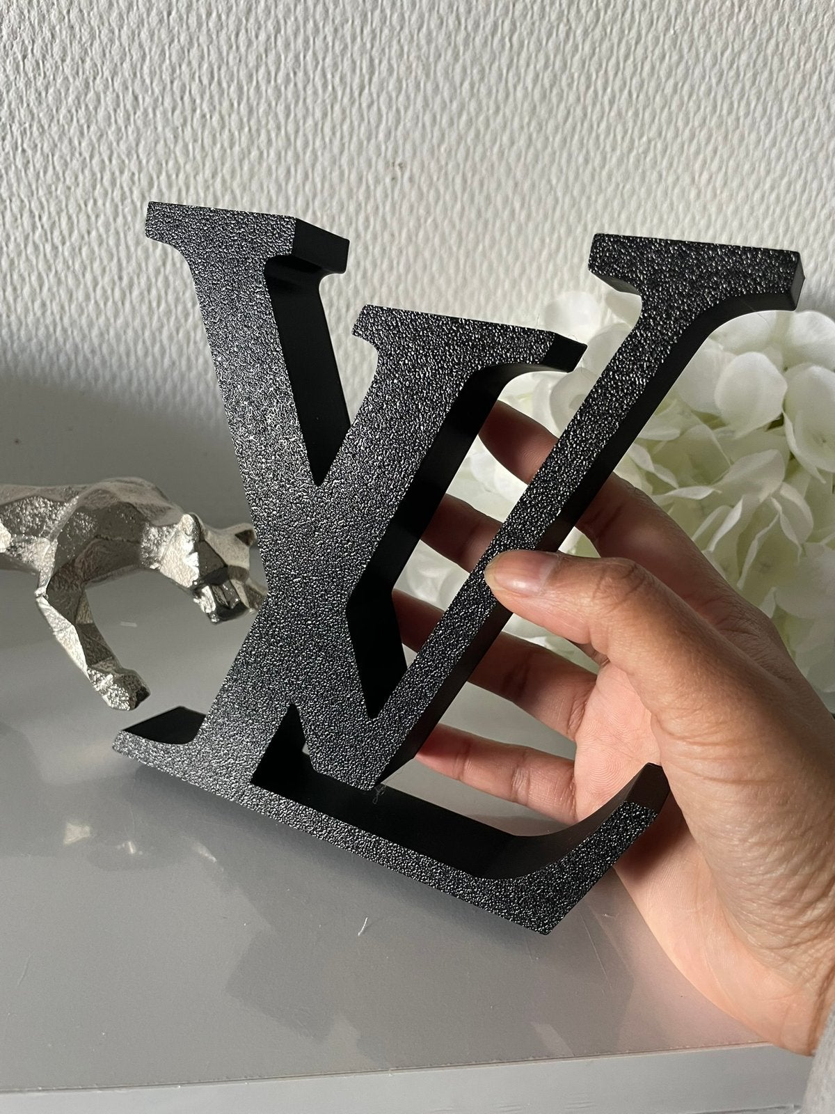 Glinsterende decoratie LV Logo object, Verzenden