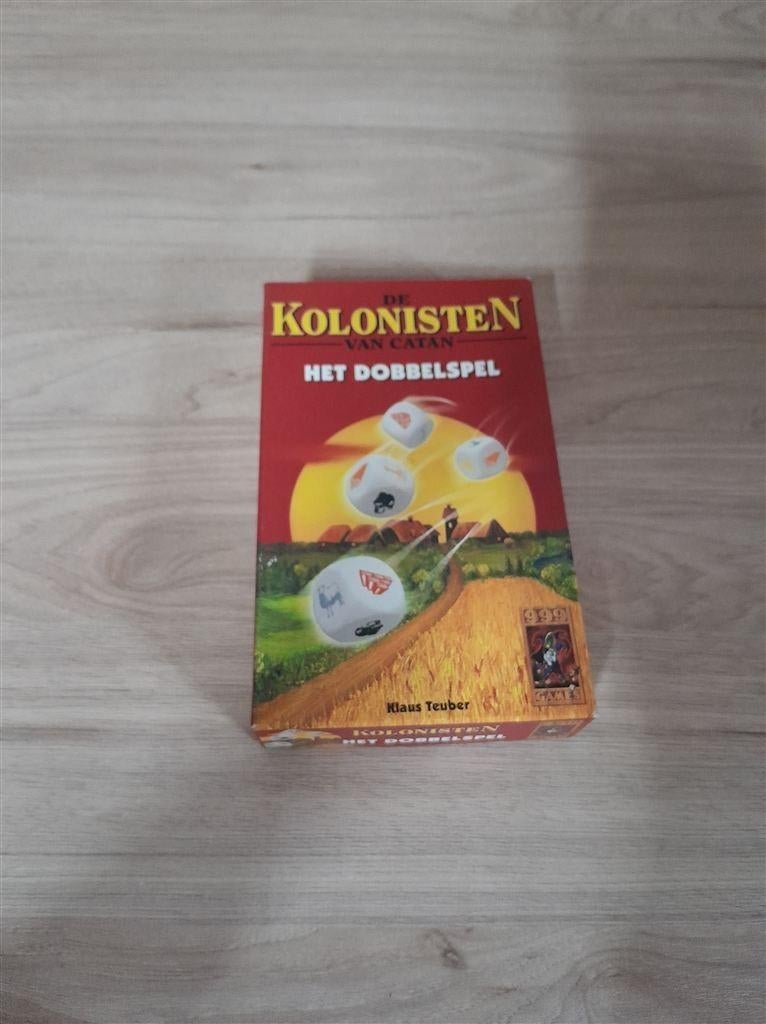 De kolonisten van Catan - het dobbelspel - s3513, Hobby en Vrije tijd, Gezelschapsspellen | Bordspellen, Verzenden, Zo goed als nieuw