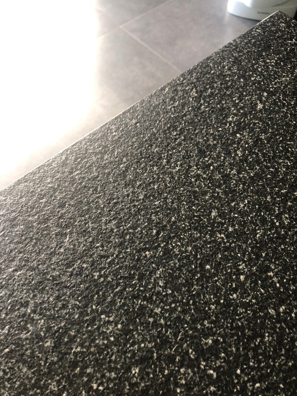 Granieten salontafel met rvs onderstel, Ophalen, Gebruikt, 100 tot 150 cm, 50 tot 100 cm
