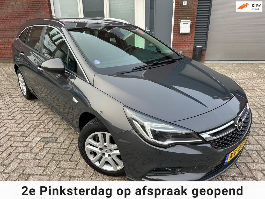 Opel Astra Sports Tourer 1.0 Edition / Airco / Cruise / Navi, Auto's, Voorwielaandrijving, Stof, Gebruikt, Met garantie (alle)