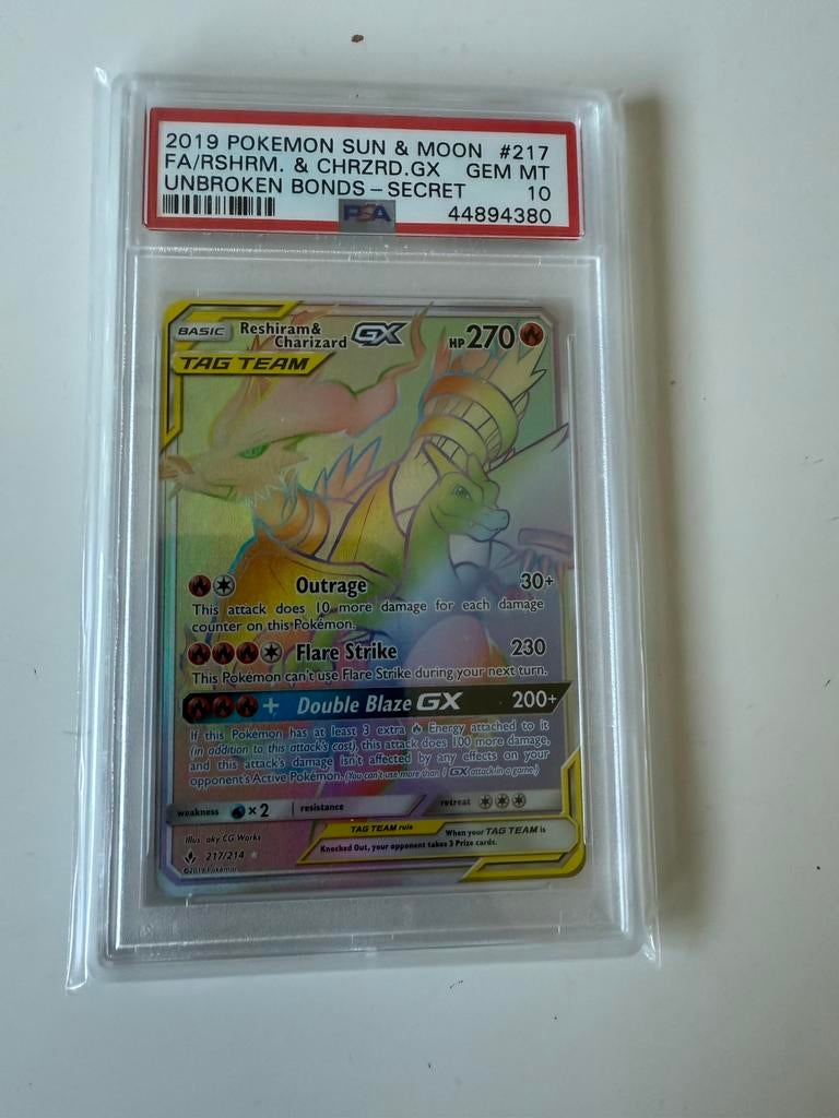Reshiram/charizard GX Rainbow PSA 10, Hobby en Vrije tijd, Verzamelkaartspellen | Pokémon, Verzenden, Zo goed als nieuw