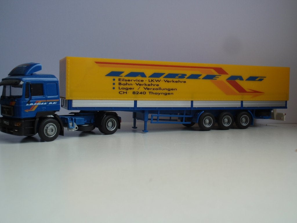 AWM MAN F90 met huiftrailer LAIBLE (CH), Hobby en Vrije tijd, Modelauto's | 1:87, Ophalen of Verzenden, Zo goed als nieuw, Bus of Vrachtwagen