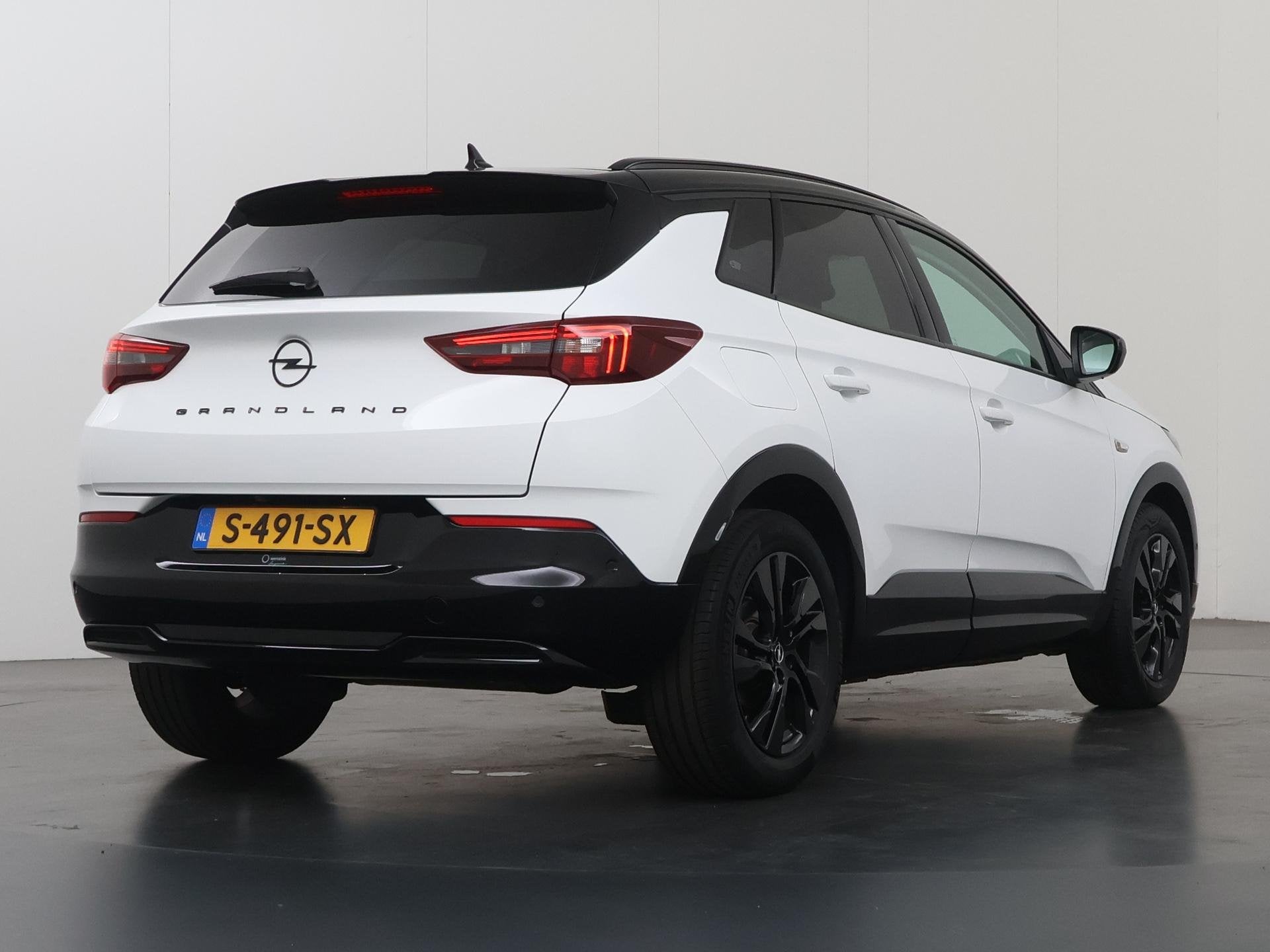 Opel Grandland 1.2 Turbo Level 4 | Navigatie | Parkeercamera, Auto's, Gebruikt, Euro 6, 1199 cc, Leder en Stof