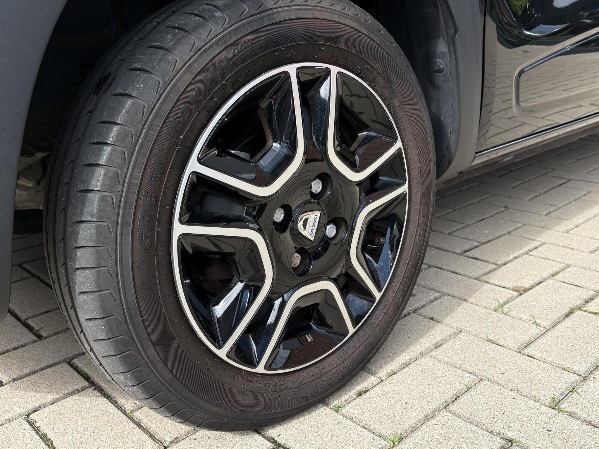 Dacia Spring Comfort 27 kWh Parkeersensoren achter, Centrale, Auto's, 12 maanden, Gebruikt, Zwart, Leder en Stof