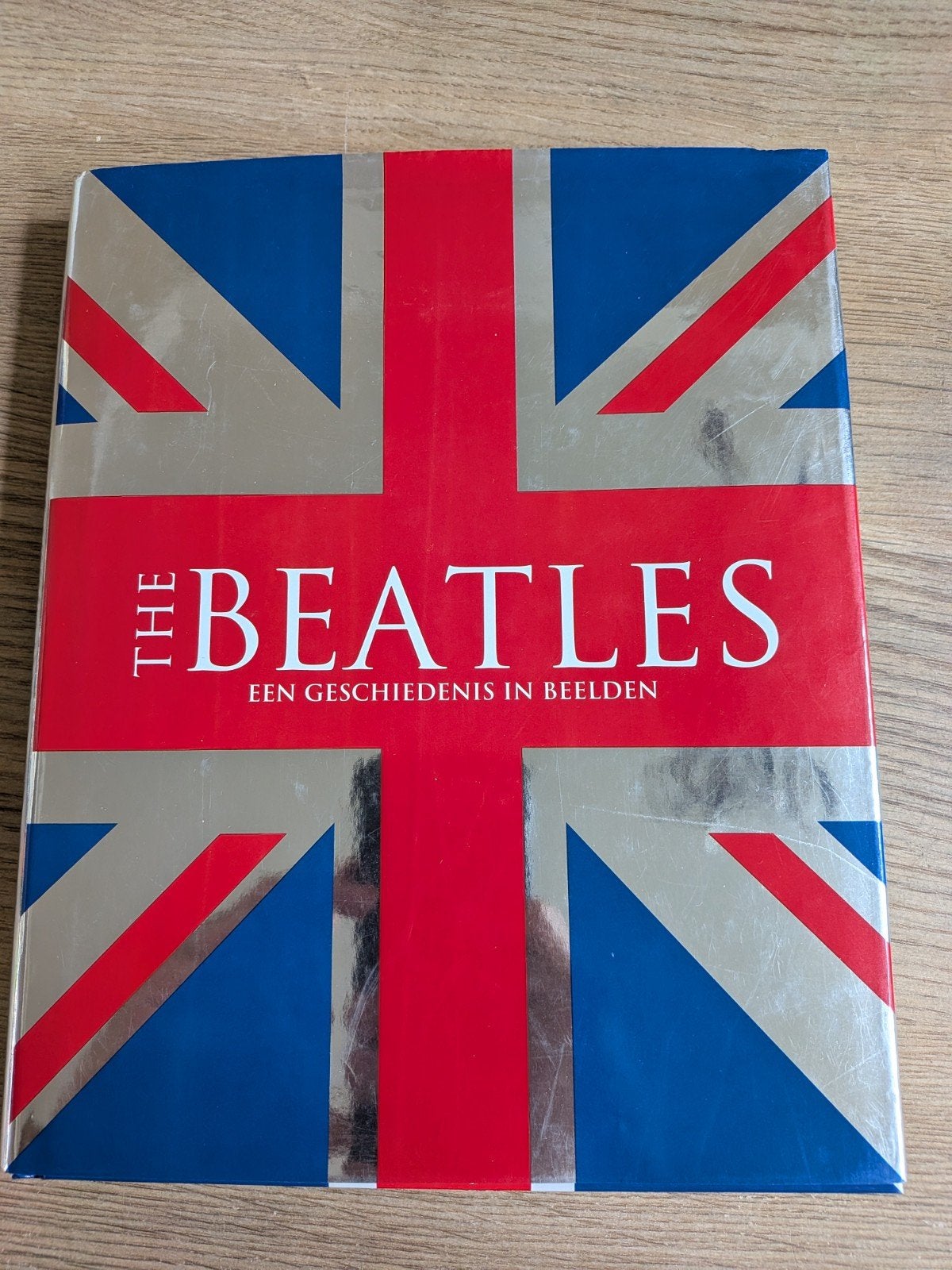 The Beatles: Een geschiedenis in beelden door Marie Clayton, Ophalen, Zo goed als nieuw