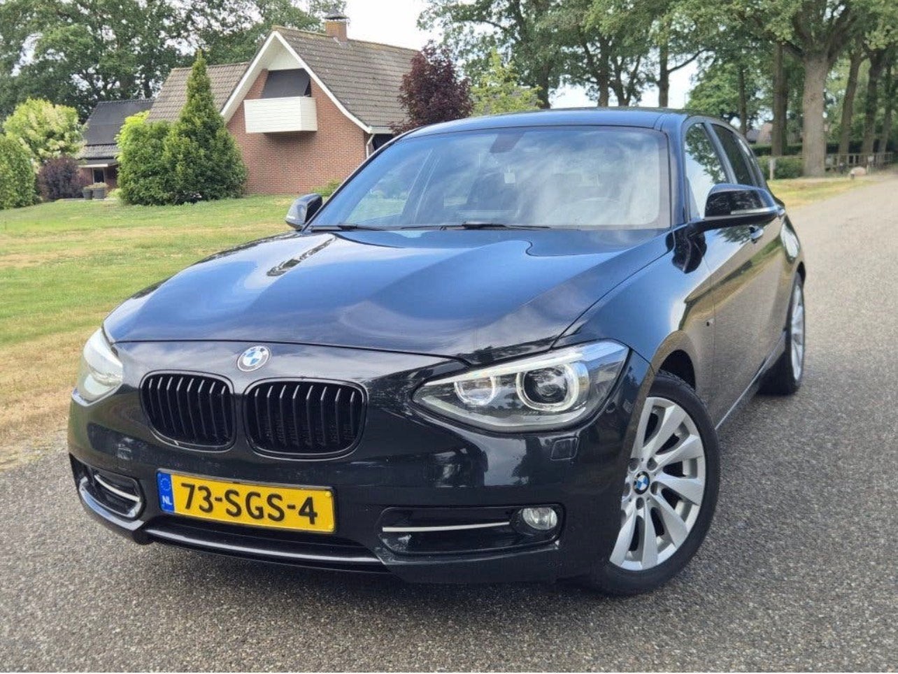 BMW 1-Serie 116I 100KW 5DR Sport 2011 Nieuwe Ketting, Auto's, 1-Serie, Euro 5, Zwart, 4 cilinders