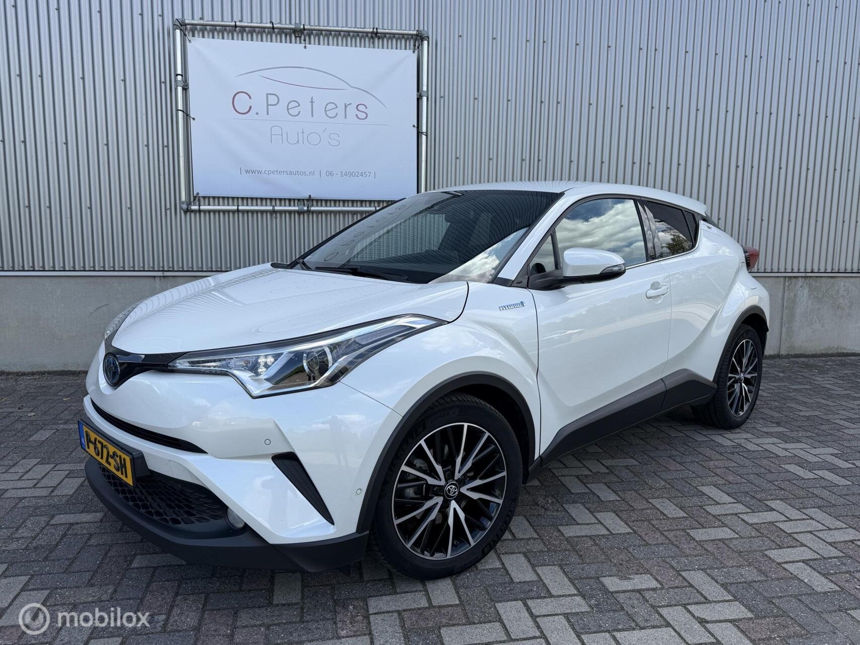 Toyota C-HR 1.8 Hybrid Dynamic 2018 / Camera / Leder / Keyle, Auto's, Dealer onderhouden, Euro 6, 4 cilinders, Leder