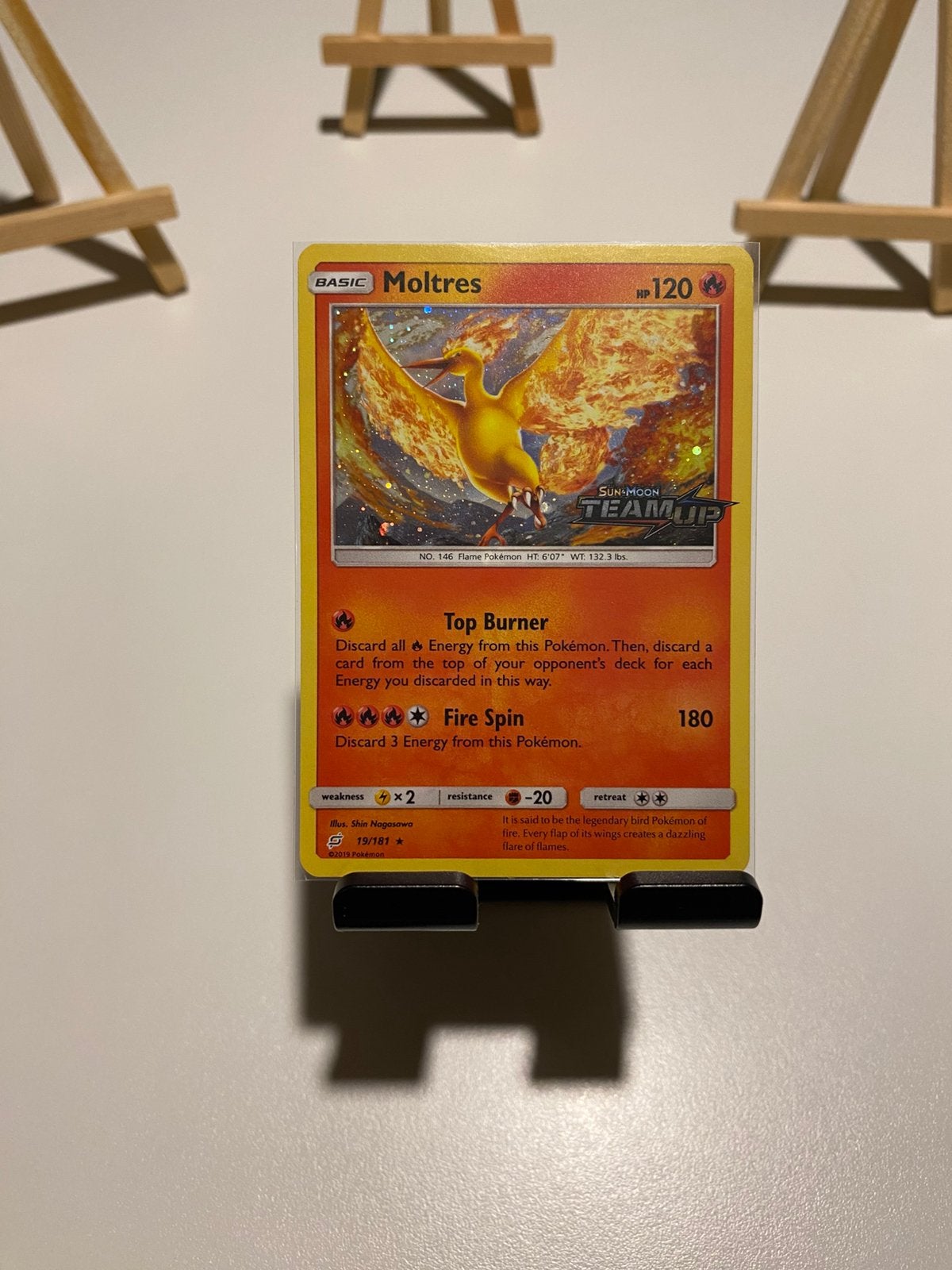 Moltres Holo Sun&Moon Team Up Stamped NM, Ophalen of Verzenden, Zo goed als nieuw