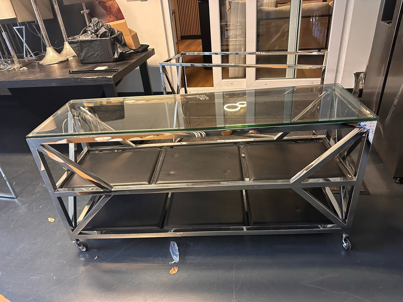Eichholtz Prada Side Table RVS met zwart leer 150x45x75cm, Ophalen, Gebruikt, 100 tot 150 cm, Metaal