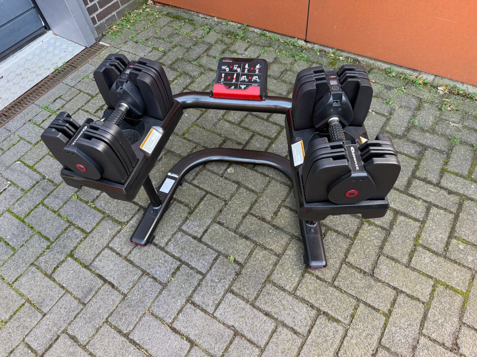 Bowflex 560 3DT  Adjustable Dumbells 2,3kg t/m 27,2kg + Rek