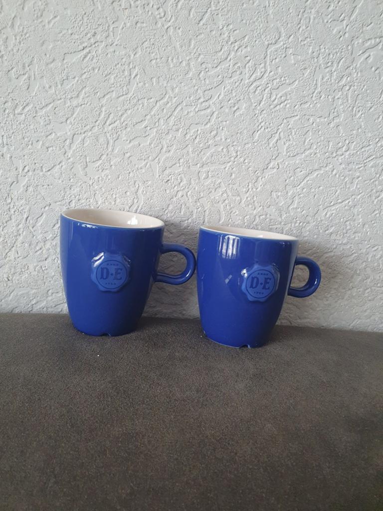 D.E. Douwe Egberts blauwe koffie/thee mokken (2 stuks), Huis en Inrichting, Keuken | Servies, Ophalen of Verzenden, Zo goed als nieuw