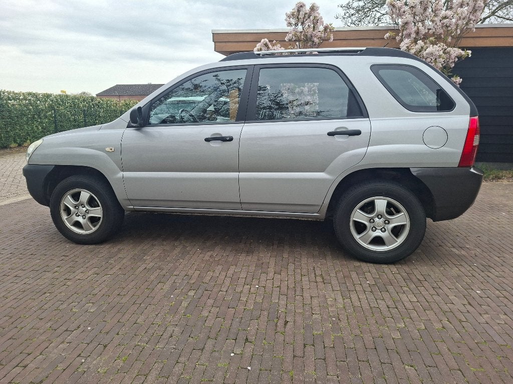 Kia Sportage 2.0 2WD 2007 Grijs, Auto's, 1442 kg, Stof, Zwart, 4 cilinders