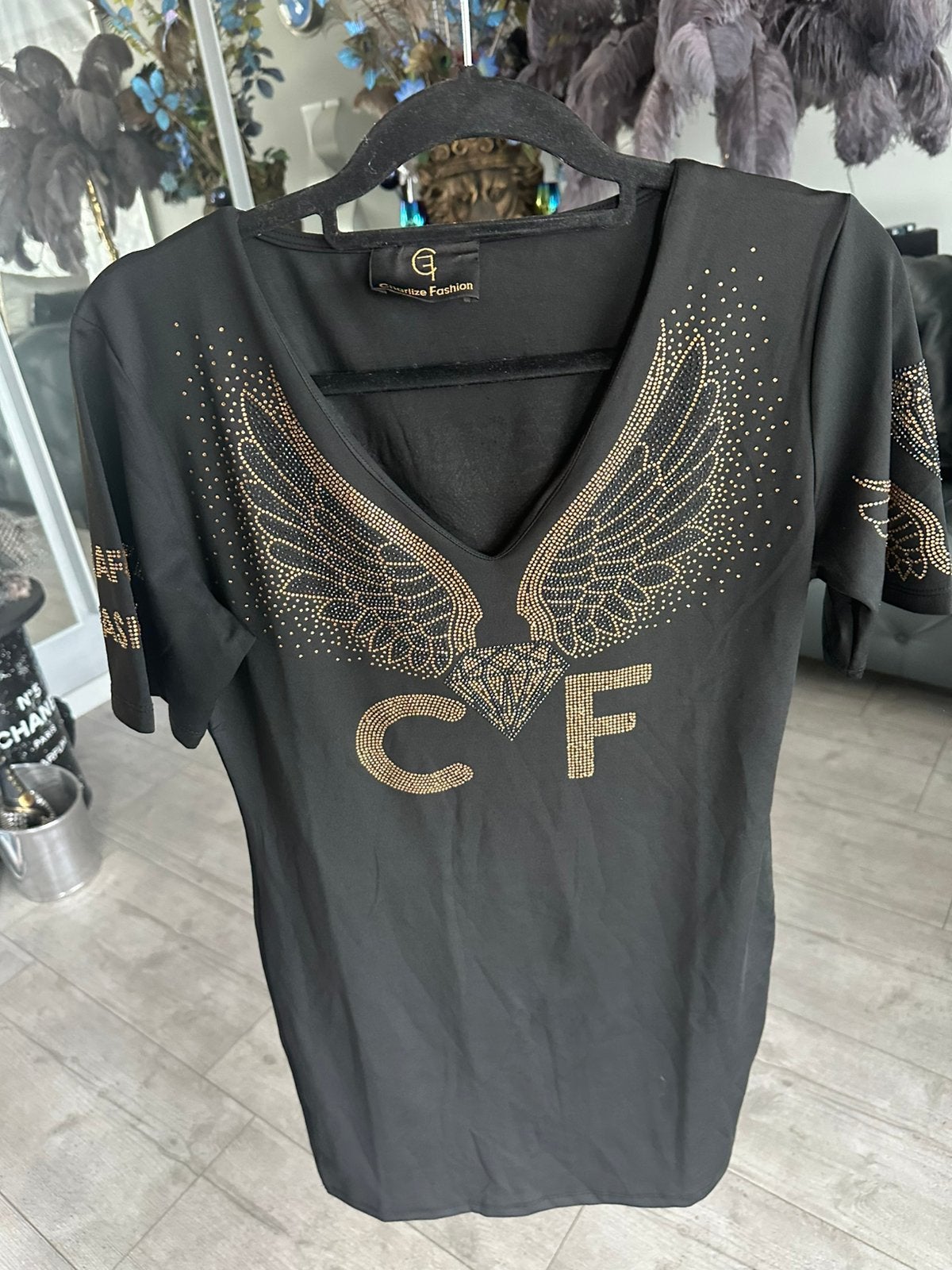 Charlize Fashion , t-shirt- jurkje ,angel wings , strass, 38, Maat 38/40 (M), Zwart, Nieuw, Ophalen of Verzenden