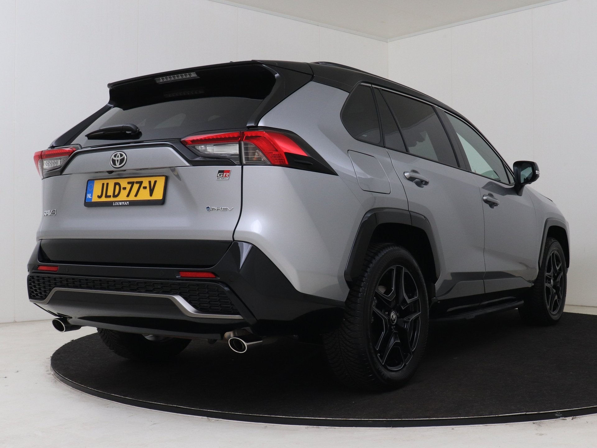 Toyota RAV4 2.5 Plug-in Hybrid AWD GR SPORT (bj 2025), Auto's, Toyota, Automaat, 12 maanden, 4 cilinders, Leder en Stof
