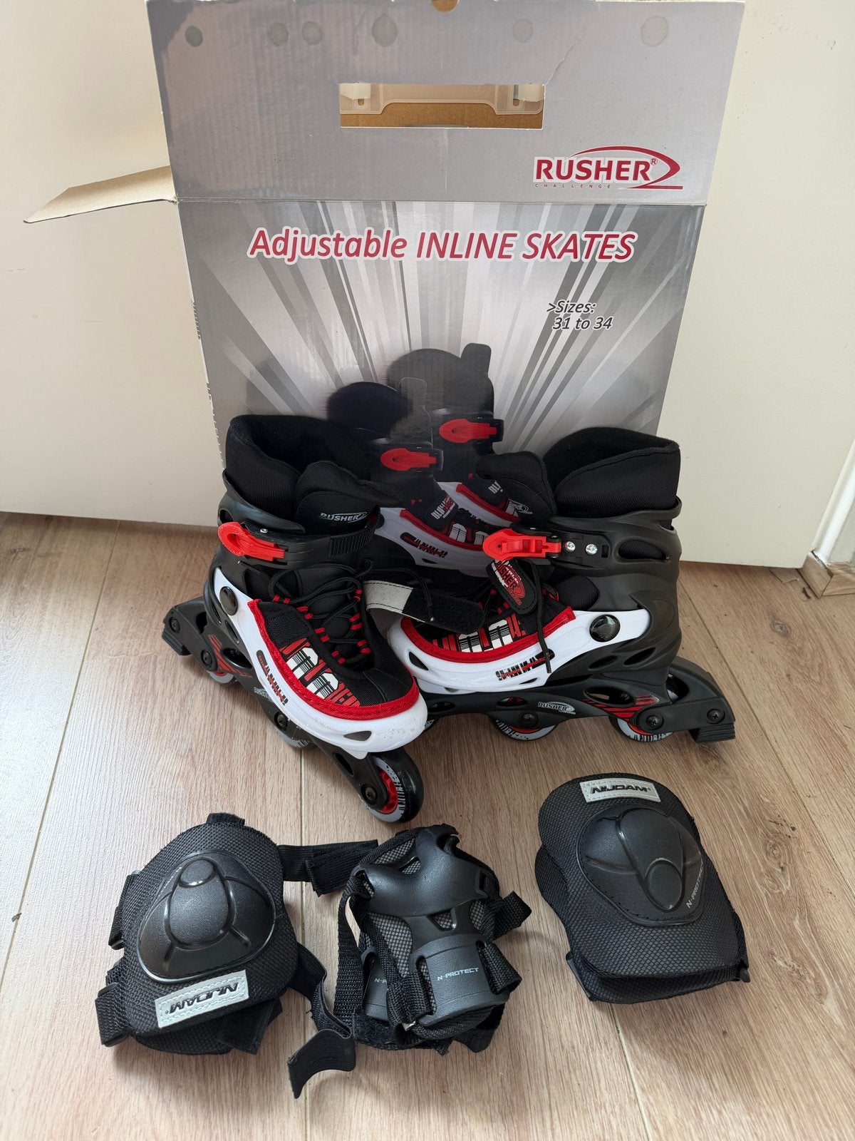 Verstelbare inline skates Rusher (maat 31-34) met beschermin, Kinderen en Baby's, Ophalen of Verzenden, Verstelbaar, Zo goed als nieuw