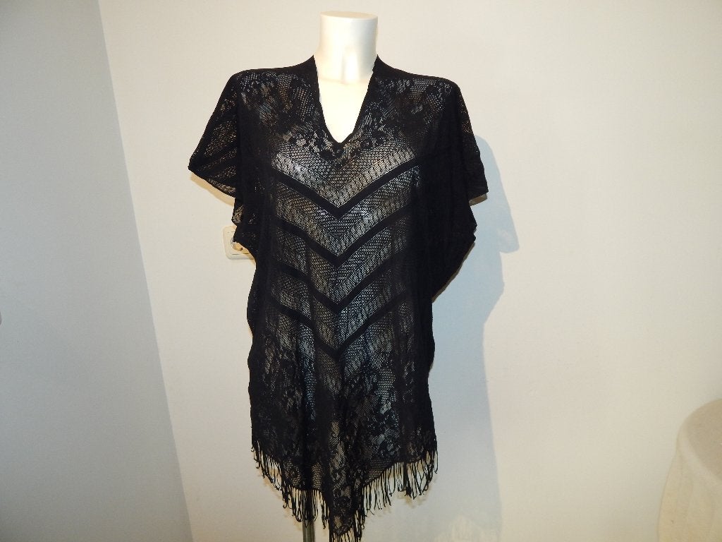 Pain de Sucre stretch poncho kant look franjes onderkant One