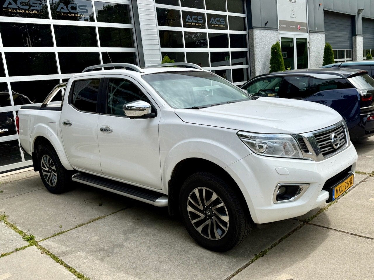 Nissan Navara 2.3 dCi Tekna DC (5-zitplaatsen) Snoeks, Auto's, Automaat, Gebruikt, Wit, Bedrijf