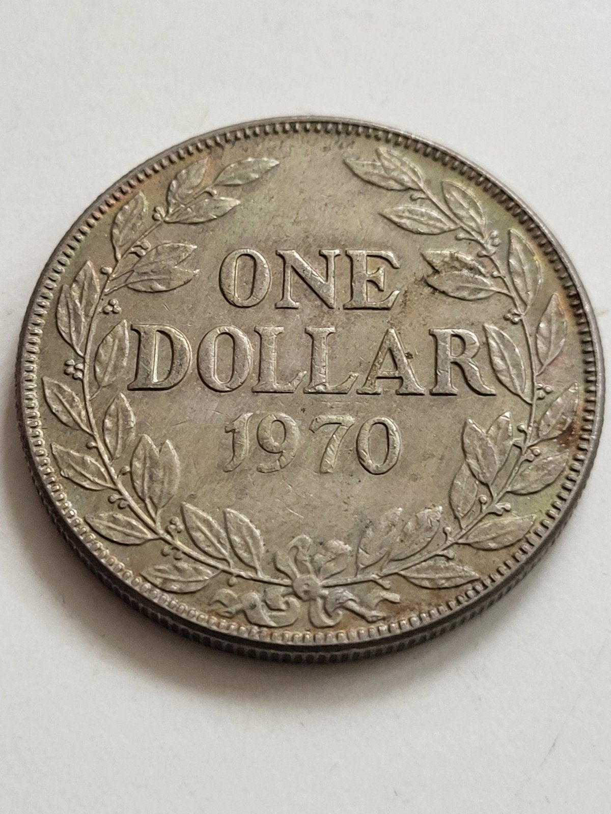 Munt Liberia 1970 one dollar met Liberte-afbeelding, Postzegels en Munten, Munten | Afrika, Ophalen of Verzenden